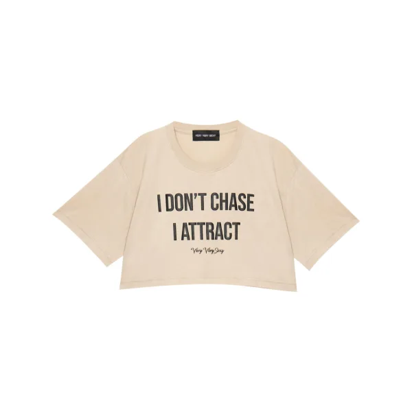 i don't chase i attract (Beige) Oversized Crop Tee